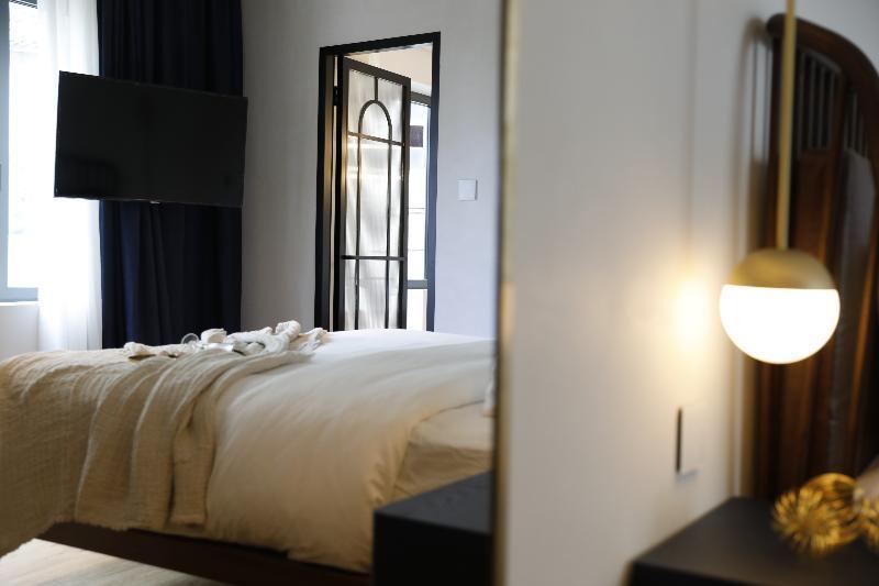 Hotel Gatsby Atenas Exterior foto A room at the hotel